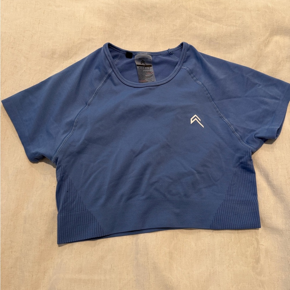 Blue Athletic Crop Top with Reflective Chevron Logo